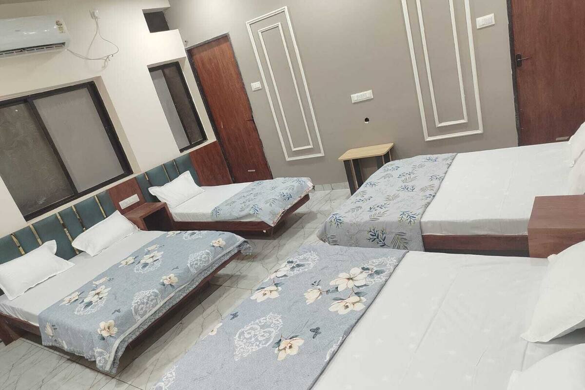 Family Quadruple Room | In-room safe, blackout drapes, iron/ironing board, free WiFi