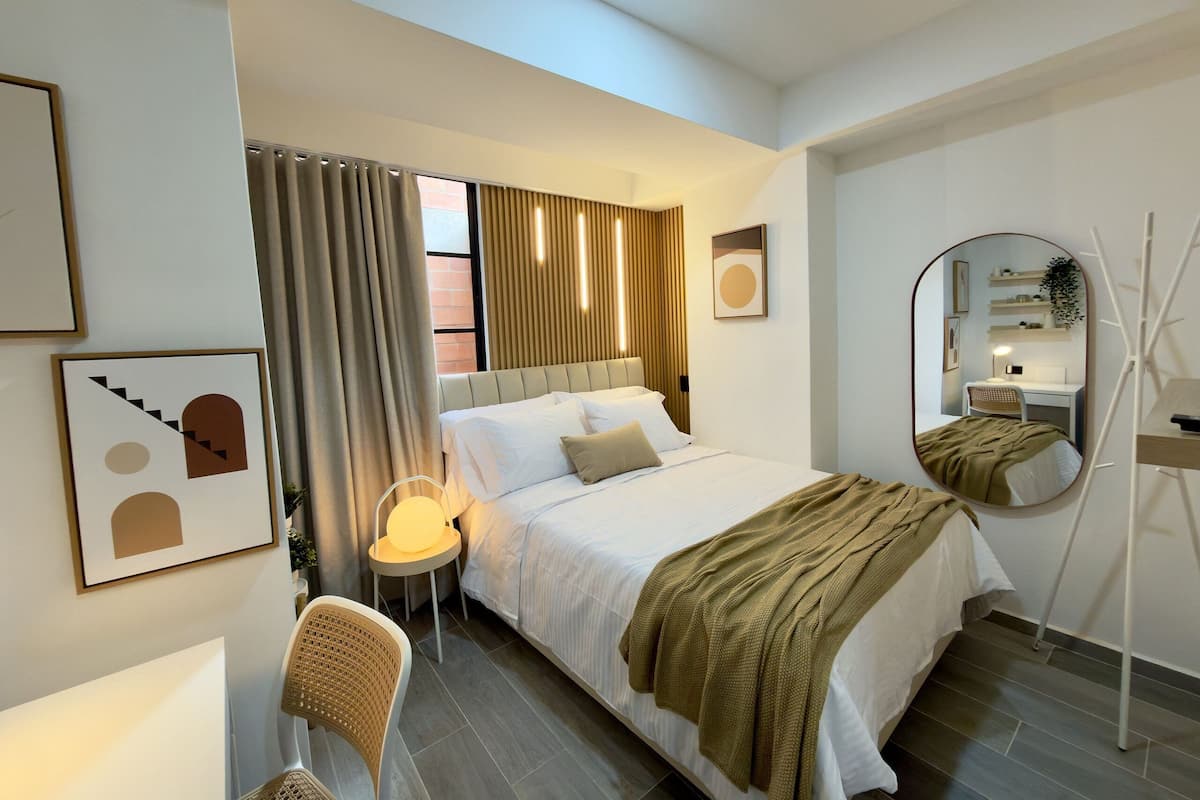 Apartment | In-room safe, desk, laptop workspace, iron/ironing board
