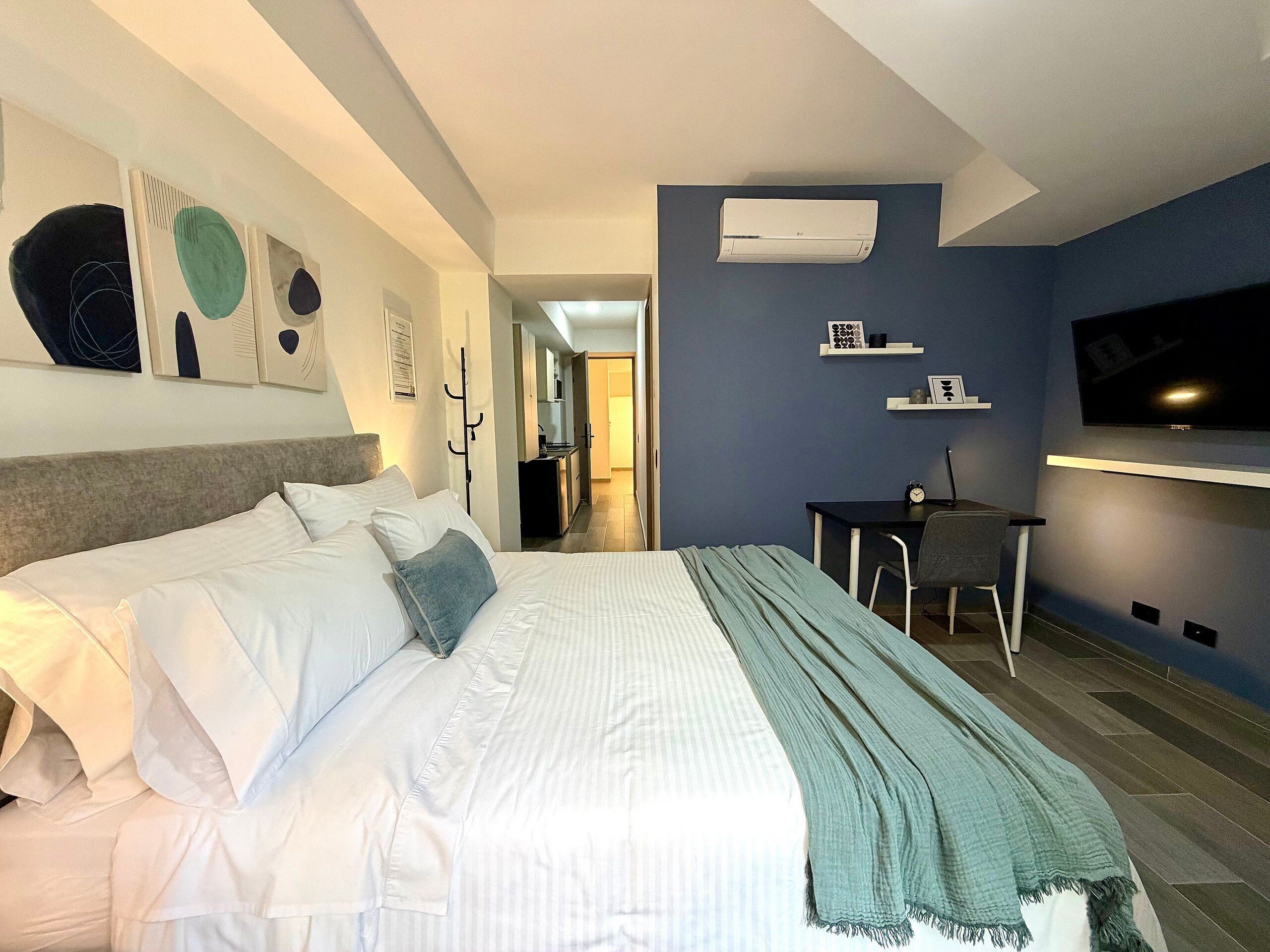 Basic Apartment | In-room safe, desk, laptop workspace, iron/ironing board