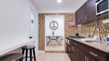 Fridge, microwave, coffee/tea maker, toaster