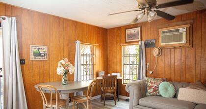 Charming 2-bedroom Country Cottage beautifully situated on 1.5 acres.