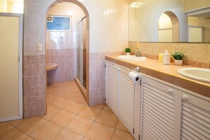 Hair dryer, towels, soap, shampoo