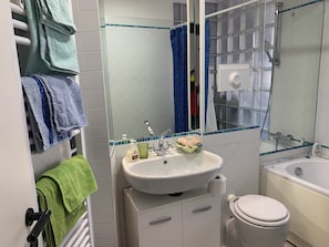 Hair dryer, towels, soap, toilet paper