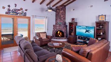 House, Multiple Beds, Patio (Playa Vida) | Living area | Fireplace
