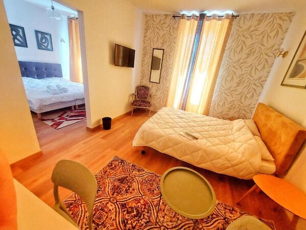 Comfort Quadruple Room | Iron/ironing board