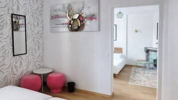 Chambre quadruple Confort | Fer et planche à repasser