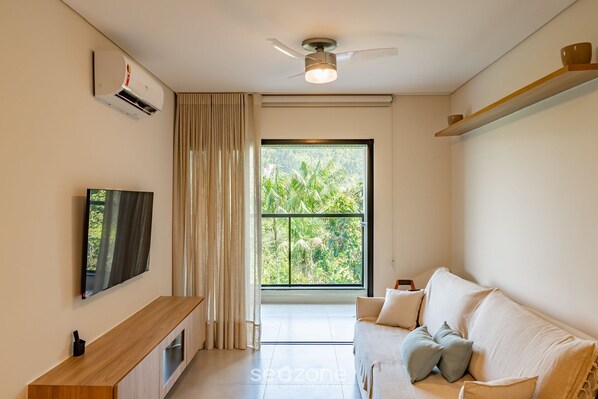 Basic Apartment | Living area | TV - Apartment w/ Barbecue 290m From the Beach Hre0035 (Ubatuba)