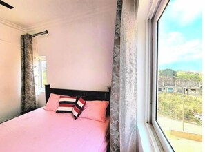 2 bedrooms, in-room safe, iron/ironing board, internet