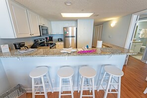 Fridge, microwave, coffee/tea maker, toaster