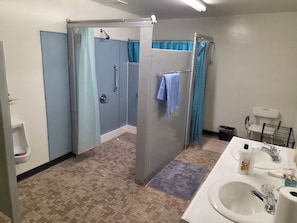 Shower, towels, soap, toilet paper