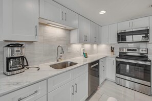 Fridge, microwave, oven, stovetop - Beachfront condo with balcony & resort pools (Myrtle Beach)