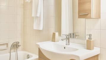 Hair dryer, towels, soap, toilet paper