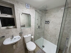 Shower, towels, soap, shampoo