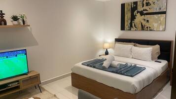 Luxury Studio Suite, Non Smoking | Desk, laptop workspace, iron/ironing board, free WiFi