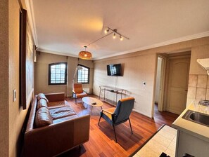 Standard Apartment, 1 Queen Bed, Private Bathroom, City View | Living area