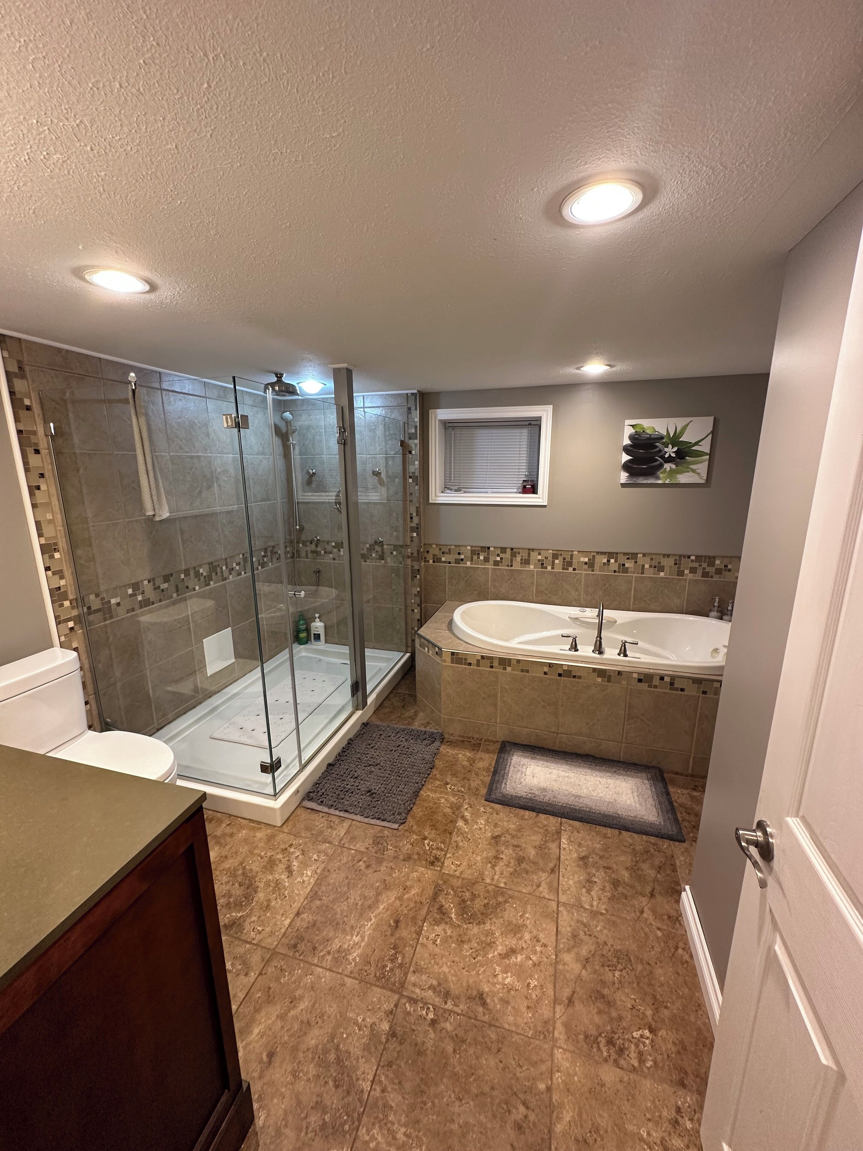 Jetted bath, hair dryer, towels, soap