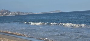 On the beach, sun-loungers, beach towels