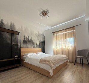 2 chambres, fer et planche à repasser, lit parapluie, Wi-Fi gratuit