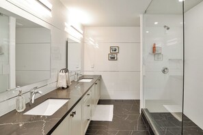 Shower, towels, soap, toilet paper