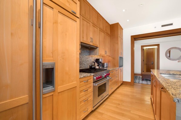 Condo (Multiple Bedrooms) | Private kitchen | Microwave, oven, dishwasher, coffee/tea maker