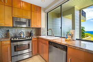 Condo (2 Bedrooms) | Private kitchen | Microwave, oven, dishwasher, coffee/tea maker