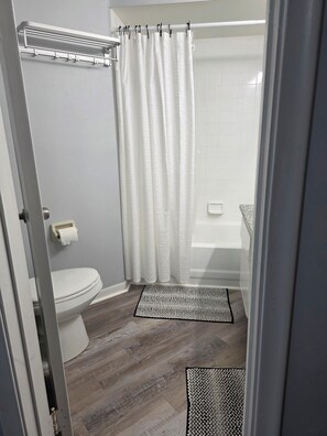 Hair dryer, towels, soap, shampoo