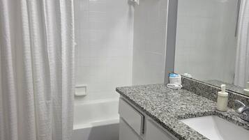 Hair dryer, towels, soap, shampoo