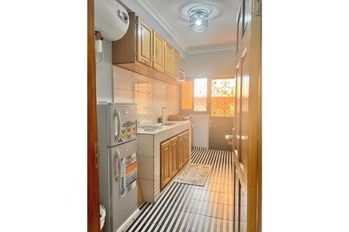 Residence Ethan Nji - Sleek retreat