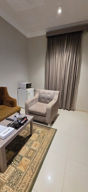 Mini-fridge, microwave, oven