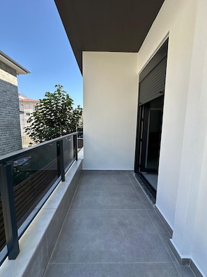 Apartamento conforto, vista para a cidade | Terraço/pátio