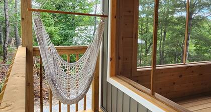 Lakefront, treetop, cottage. Immerse yourself in a panorama of nature.