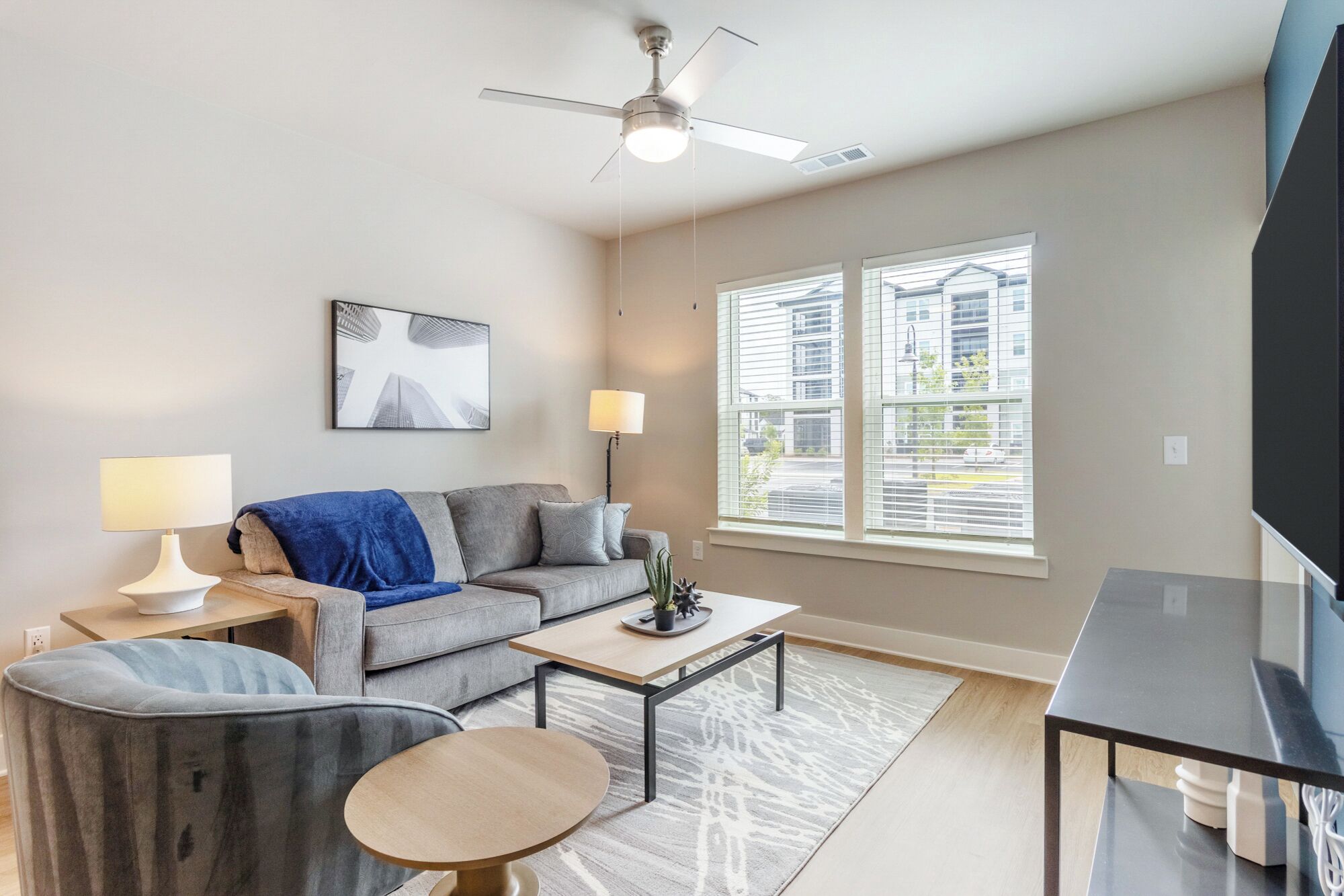 Apartment, 1 Bedroom | Living area | 50-inch TV with digital channels