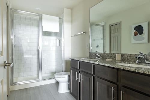 Apartment, 2 Bedrooms (QueenBed) | Bathroom | Combined shower/bathtub, free toiletries, hair dryer, towels