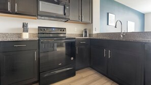 Apartment, 1 Bedroom | Private kitchen | Full-sized fridge, microwave, oven, stovetop