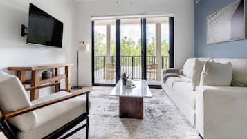 Apartment, 2 Bedrooms (QueenBed) | Living area | 50-inch TV with digital channels