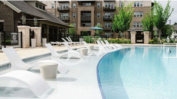 Seasonal outdoor pool, free pool cabanas, pool loungers