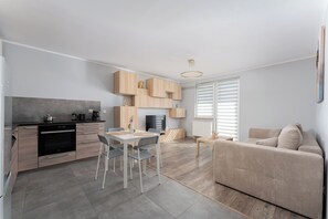 TV - Osiedle Piastów Charming Apartment (Kraków)