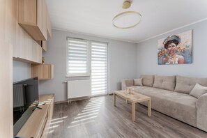 TV - Osiedle Piastów Charming Apartment (Kraków)