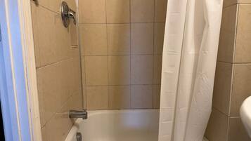 Combined shower/tub, free toiletries, towels, soap