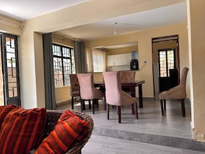 Family Villa, Garden View | Living area | 32-inch Smart TV with digital channels
