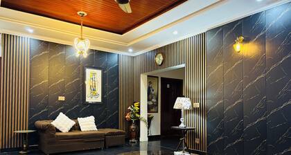 “Spacious King Rooms Prime DHA Location Perfect for Business & Family Stays