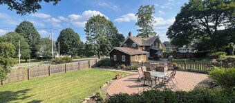 Historic 5-bedroom house with beautiful back yard suitable for private events.