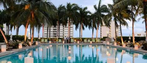 2 outdoor pools, pool umbrellas, pool loungers