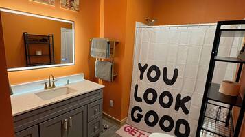 Shower, hair dryer, towels, soap