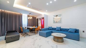Royal Studio Suite, Multiple Beds, Non Smoking, Private Bathroom | Living area | 75-inch LCD TV with digital channels, heated floors