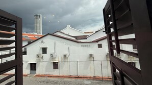 Tremannsrom, byutsikt | Utsikt fra rommet