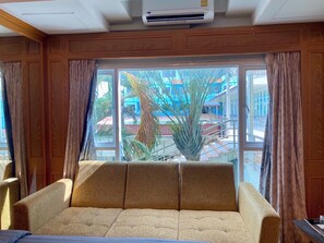 Deluxe Twin Room, Pool View | Desk, free WiFi, bed sheets