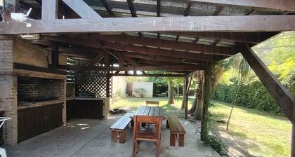 Spacious house with garden, steps from the beach and Montevideo.