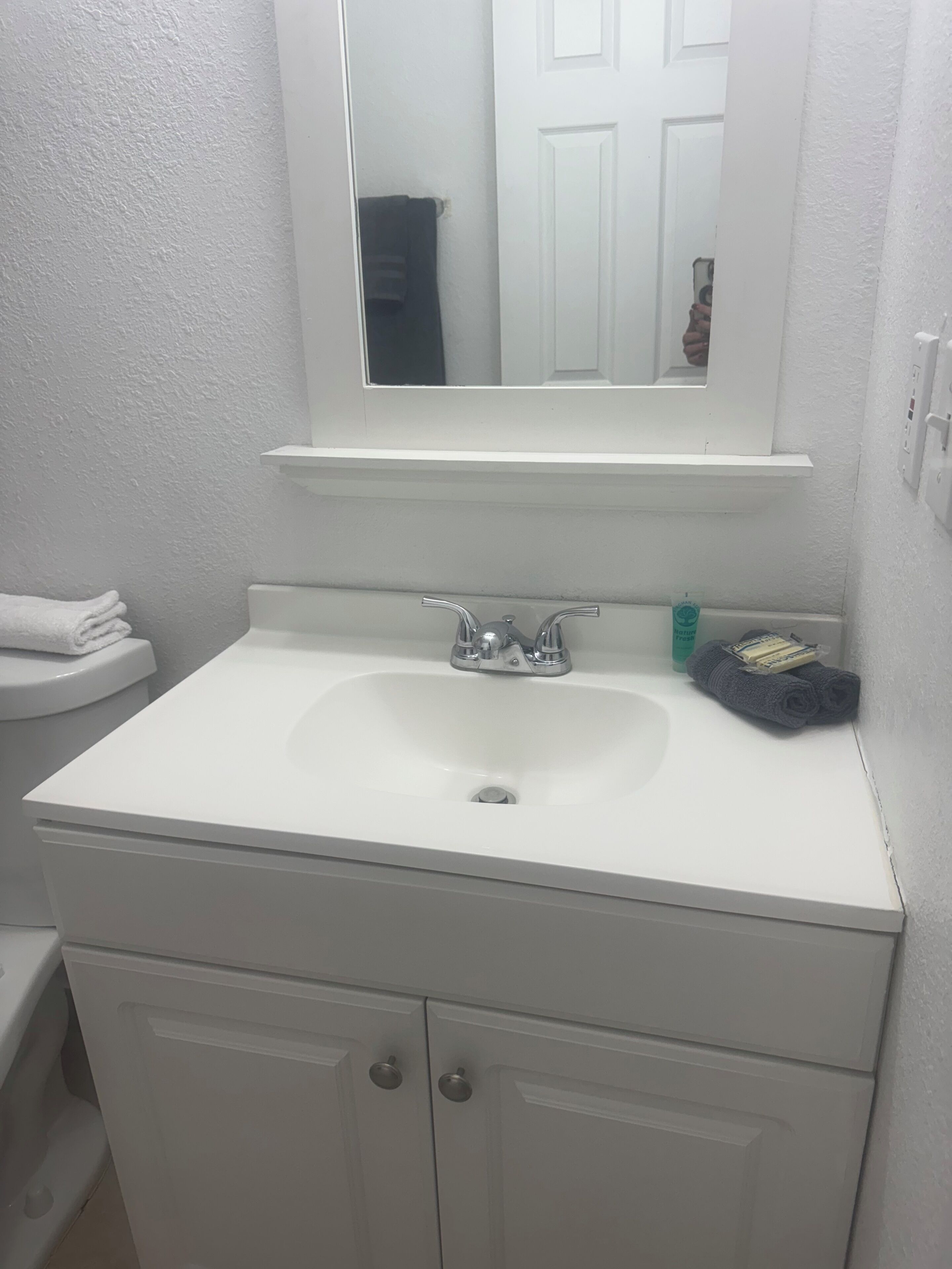 Hair dryer, towels, soap, toilet paper