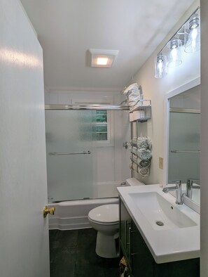 Hair dryer, towels, soap, shampoo